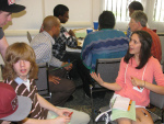 Youth strategize their lobbying agendas in preparation for meetings with their representatives' staff.